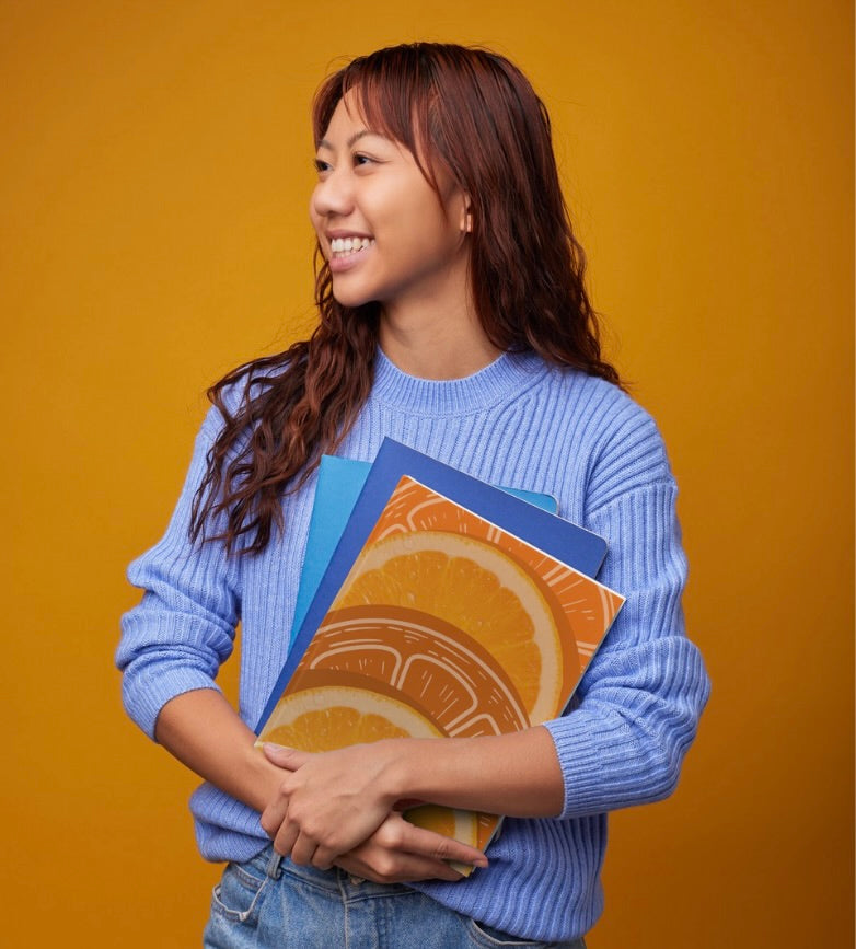 Notebook with orange slice cover design, spiral bound