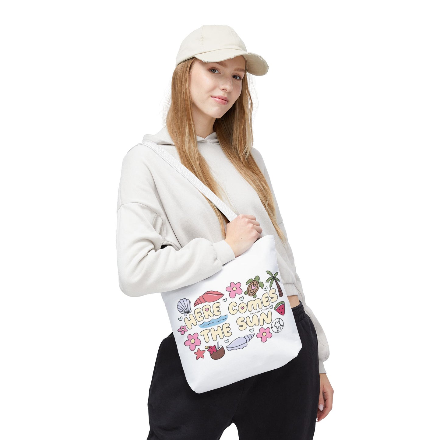 White tote with themed illustration "Here comes The Sun "